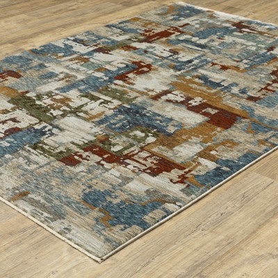 6.7x9.6 Blue and Beige Abstract Synthetic Area Rug