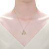 Rhodium and 14k gold plated floral pendant necklace with sparkling cubic zirconia for a touch of elegance - 2 of 3