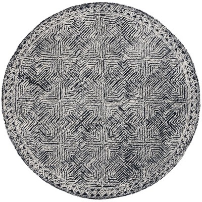 Metro MET480 Tufted Indoor Rug - Safavieh