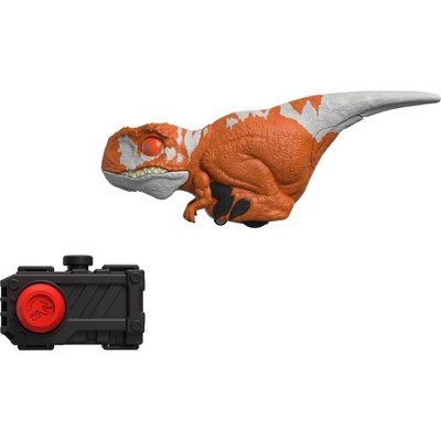 Photo 1 of Jurassic World: Dominion Uncaged Click Tracker Atrociraptor Red Dinosaur Toy