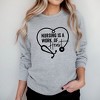 Simply Sage Market Women's Graphic Sweatshirt Nursing Is A Work Of Heart - 2 of 3