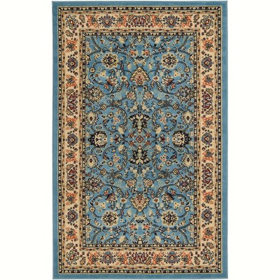 Light Blue and Ivory Synthetic Reversible Washable Area Rug 4' x 6'