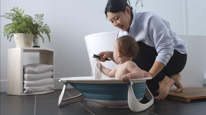 The First Years Infants and Toddlers Sure Comfort Collapsible Baby Bathtub, 2 of 10, play video