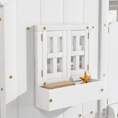 Close-up of the bed side panel with window-style gate and starfish decor