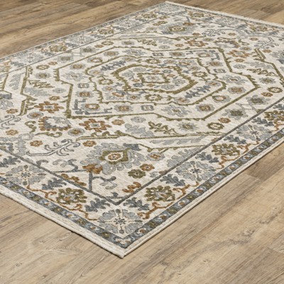 Hastings Ivory and Green Synthetic Rectangular Area Rug 5'3" x 7'6"