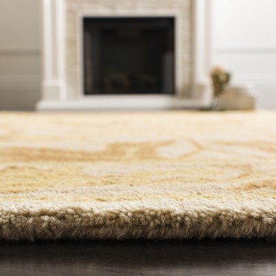 Hand-Tufted Beige and Gold Wool Round Area Rug, 6'
