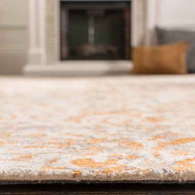 Handmade Ivory/Rust Tufted Wool-Viscose Blend Rectangular Rug 4' x 6'
