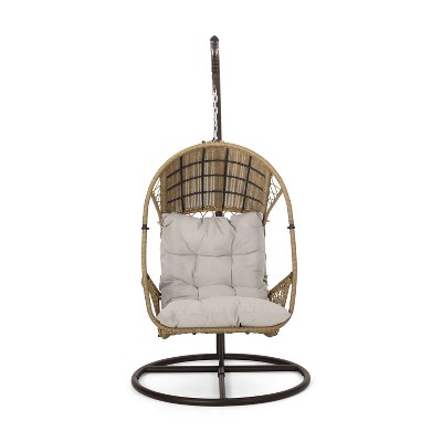 Malia outdoor standing wicker basket chair with cushion by christopher best sale knight home