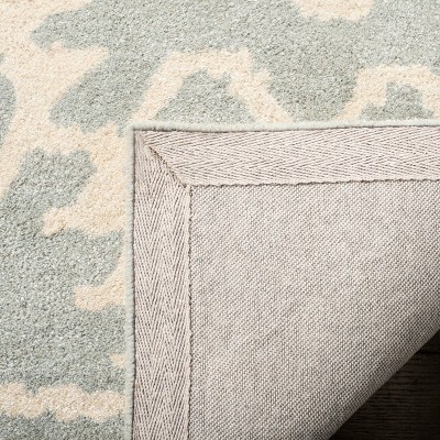 Grey and Ivory Hand-Tufted Wool 6' x 9' Area Rug