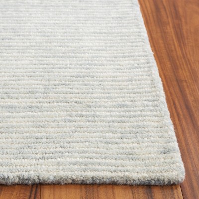Ebony EBN950 Handmade Tufted Rug - Safavieh