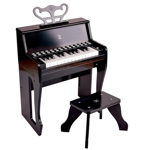 Child's toy piano and stool online