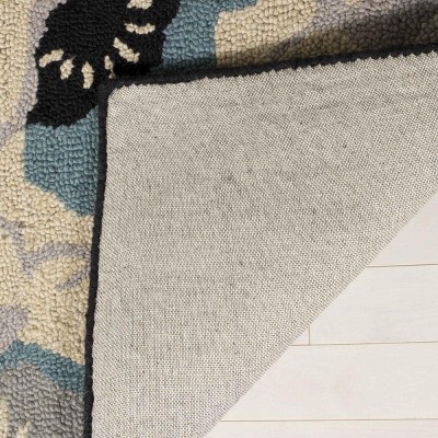 Hand-Tufted Blue Wool Rectangular 4' x 6' Area Rug