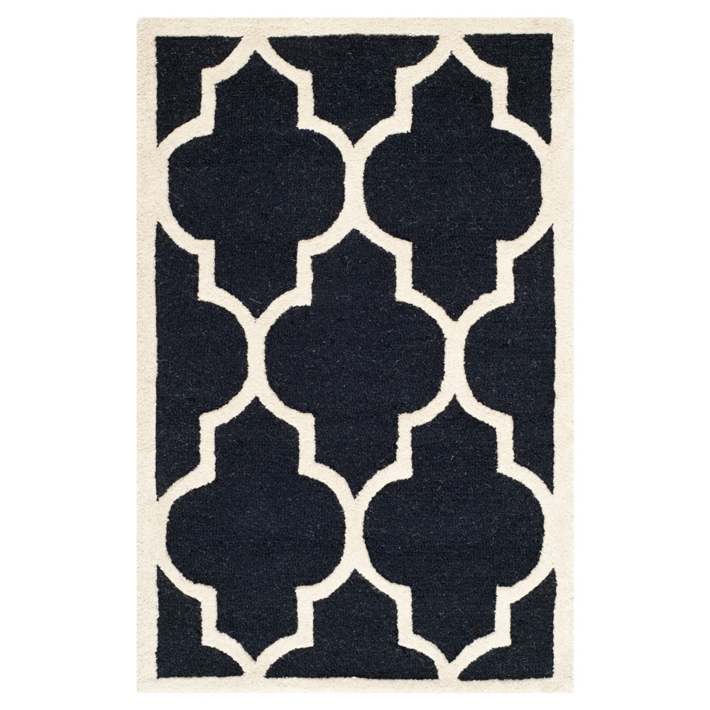 2'6inx4' Geometric Accent Rug Black/Ivory - Safavieh