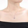White gold plated necklace with cubic zirconia door knocker love knot pendant, combining elegant design with sparkling detail - 2 of 3