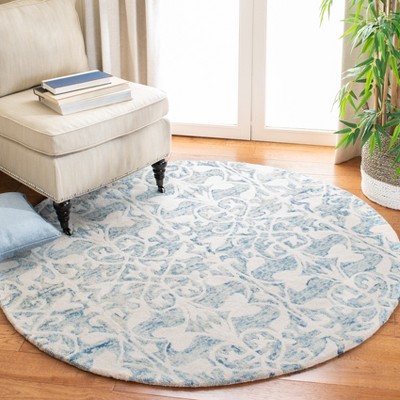 Hand-Tufted Dark Blue and Ivory Round Wool Rug