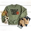 Simply Sage Market Women's Graphic Sweatshirt Trick Or Treat Vibes Pumpkin - image 3 of 4