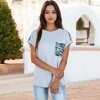 Anna-Kaci Women's Short Sleeve Top with Rolled Cuffs and Zebra Print Front Pocket Detail - 4 of 4