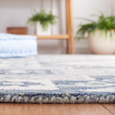 Ivory Hand-Tufted Wool Rectangular Area Rug 5' x 8'