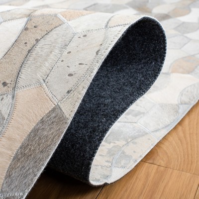 Geometric Patchwork Cowhide Area Rug in Cream and Gray - 5' x 8'