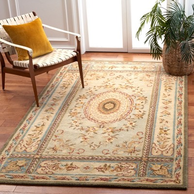 Ivory and Light Blue Handmade Wool Tufted Rug, 5' x 8'