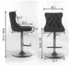 The two modern gray velvet swivel bar stools are height, backrest, and footrest adjustable. - 3 of 4