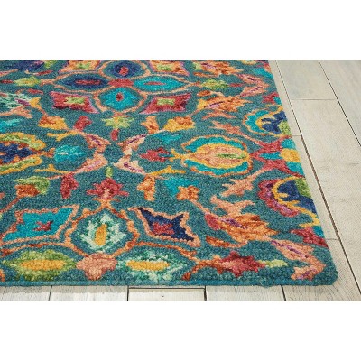 Handmade Teal Floral Wool Area Rug 5' x 7'