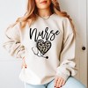 Simply Sage Market Women's Graphic Sweatshirt Leopard Nurse Heart - 2 of 3