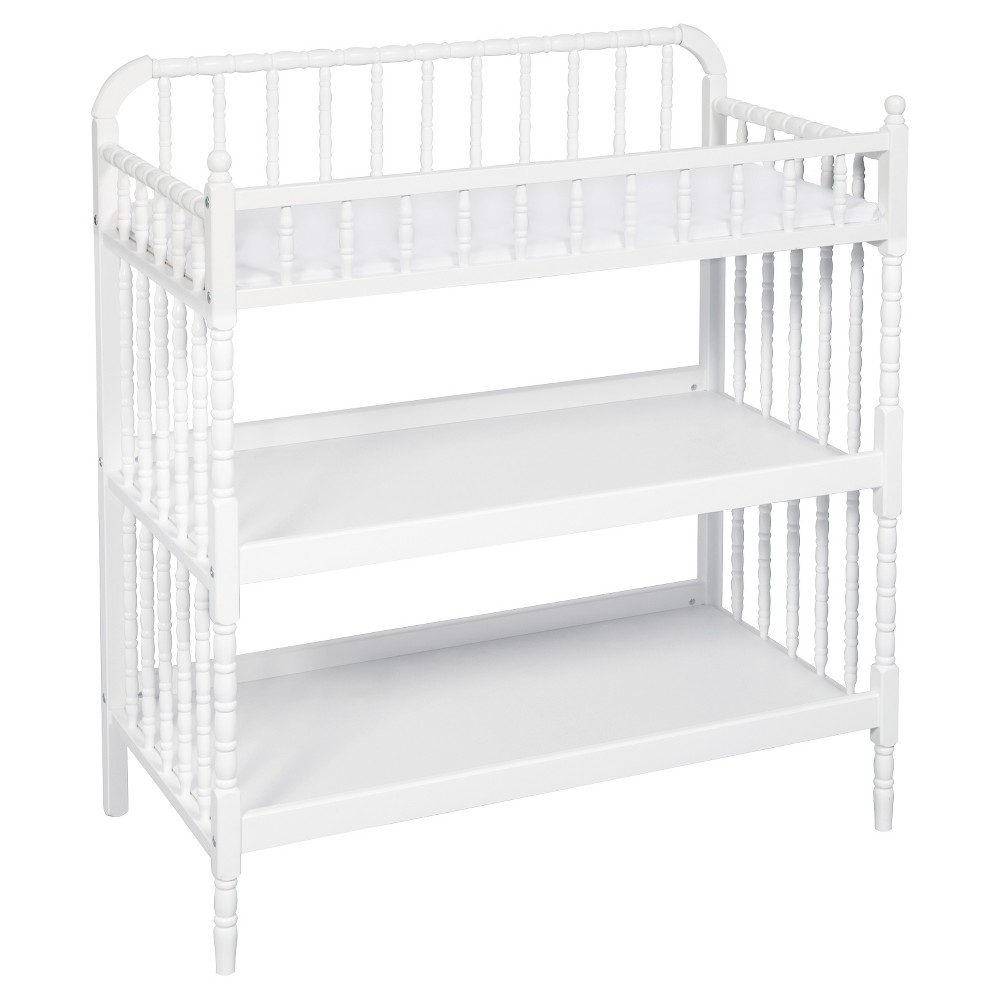 DaVinci Jenny Lind Changing Table - White Delight in traditional beauty with DaVinci's Jenny Lind Changing Table. Intricate spindle posts deliver classic grace from top to toe, for a perfect pairing with the Jenny Lind Crib. Spacious, open shelves keep diapers and lotions within easy reach for convenient changings. Coordinates with the Jenny Lind 3-in-1 Convertible Crib. Color: White.
