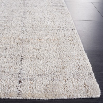 Ivory Abstract Handmade Tufted Wool Area Rug
