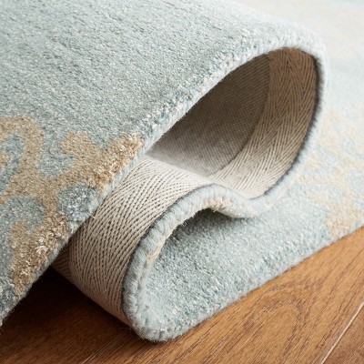 Handmade Turquoise and Yellow Wool Viscose 6' x 9' Area Rug