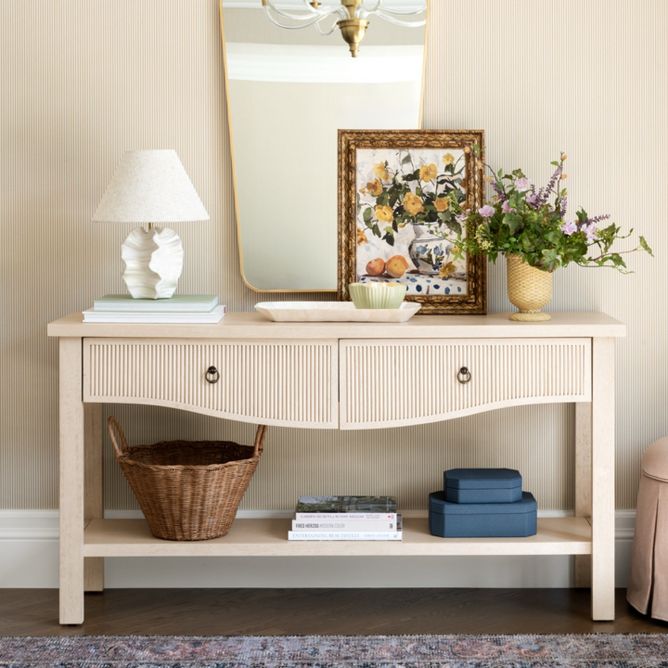 Welcoming entry with coastal vibes and scalloped details
