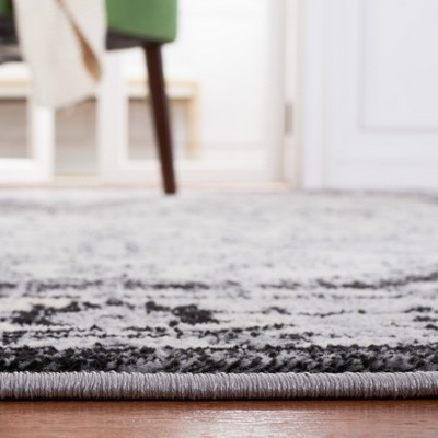 Brentwood Square Black/Ivory Hand-Knotted Synthetic Area Rug