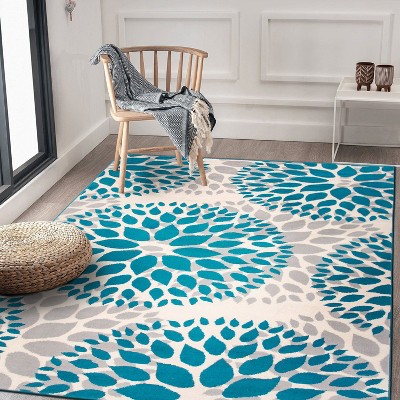 Blue Floral Synthetic Easy Care Area Rug 7'6" x 9'5"