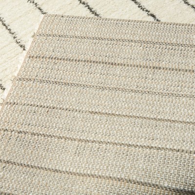 White Geometric Polyester and Polypropylene Area Rug