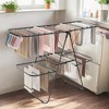 2-Level Foldable Clothes Drying Rack with Height-Adjustable Wings, Free-Standing Laundry Rack Clothes Dryer, 33 Drying Rails, and Sock Clips - 3 of 4
