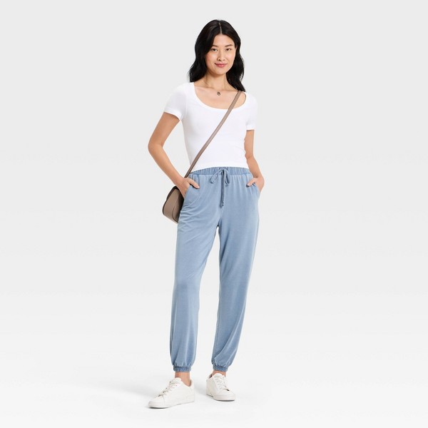 Pantalones jogger de mezclilla para mujer con cintura y puños elásticos - A New Day™ azul claro 3