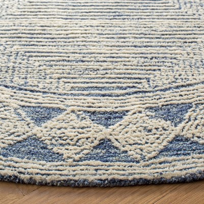 Ivory and Navy 4' Round Hand Tufted Wool Area Rug