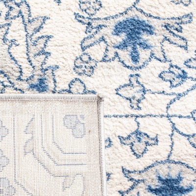 Brentwood 4' x 6' Blue and Cream Synthetic Area Rug