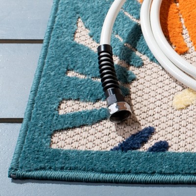 Ivory and Blue Geometric Synthetic Indoor/Outdoor Rug