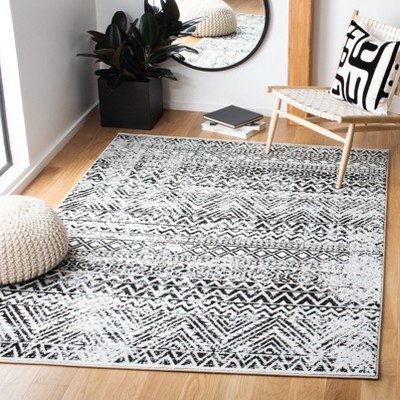 Ivory and Charcoal Geometric 9' x 12' Synthetic Area Rug