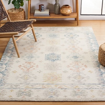 Handmade Blue and Ivory Wool 4' x 6' Tufted Area Rug