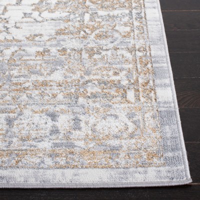 Abstract Gray and Gold 4'5" x 6'5" Synthetic Area Rug