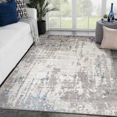 Blue and Ivory Abstract 9' x 12' Synthetic Area Rug