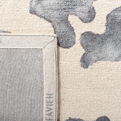 Handmade Black and Beige Wool Tufted Area Rug