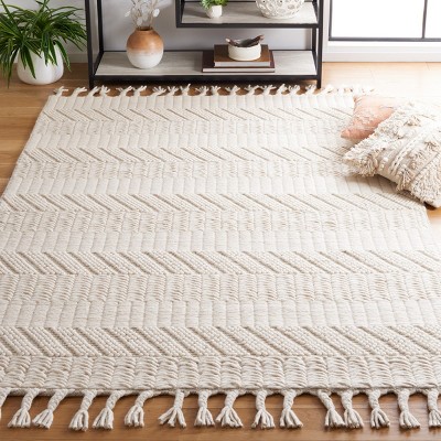 Ivory Handmade Wool Tufted 6' x 9' Area Rug
