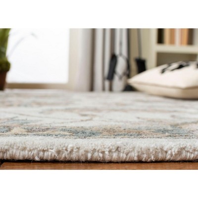 Ivory and Light Grey 6' x 9' Hand-Tufted Wool Area Rug