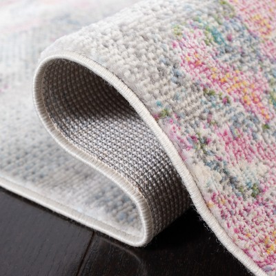 Ivory and Pink Abstract Synthetic Area Rug
