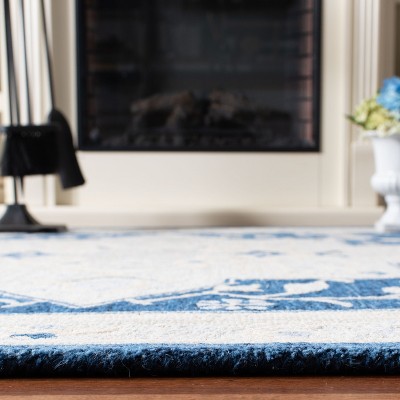 Navy and Ivory Tufted Handmade Wool 8' x 10' Area Rug