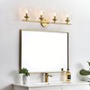 Elegant Lighting Ingrid 4 light Brass and Clear Bath Sconce - 3 of 4