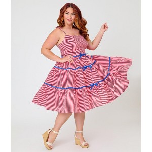unique vintage plus size dresses 1950s Pinafore Swing Dress Cast in a classic mid century light pink Unique Vintage Plus Size 1950S
